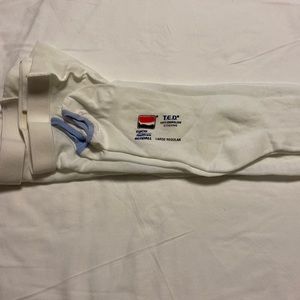 1 new pair anti-embolism stockings thigh high- large regular